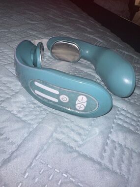 Teal Neck Massager with multi function Control Panel